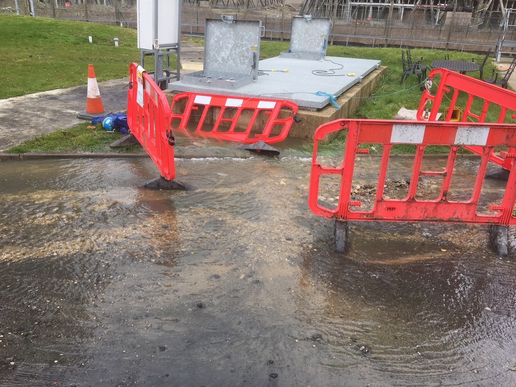 Flooded area with construction barriers