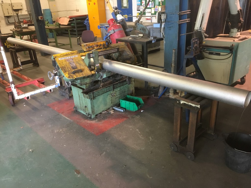 Metal pipe on workshop machinery