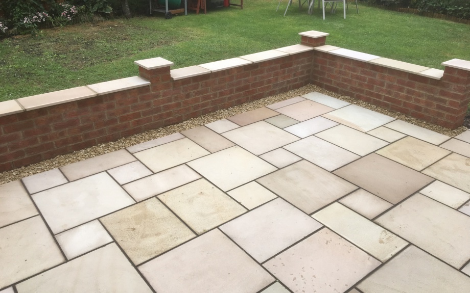 Patio with brick wall borders