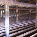 Wooden beams in dim space